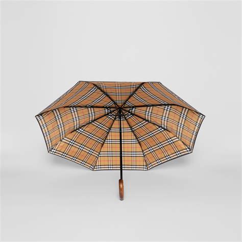 burberry check lined folding umbrella.